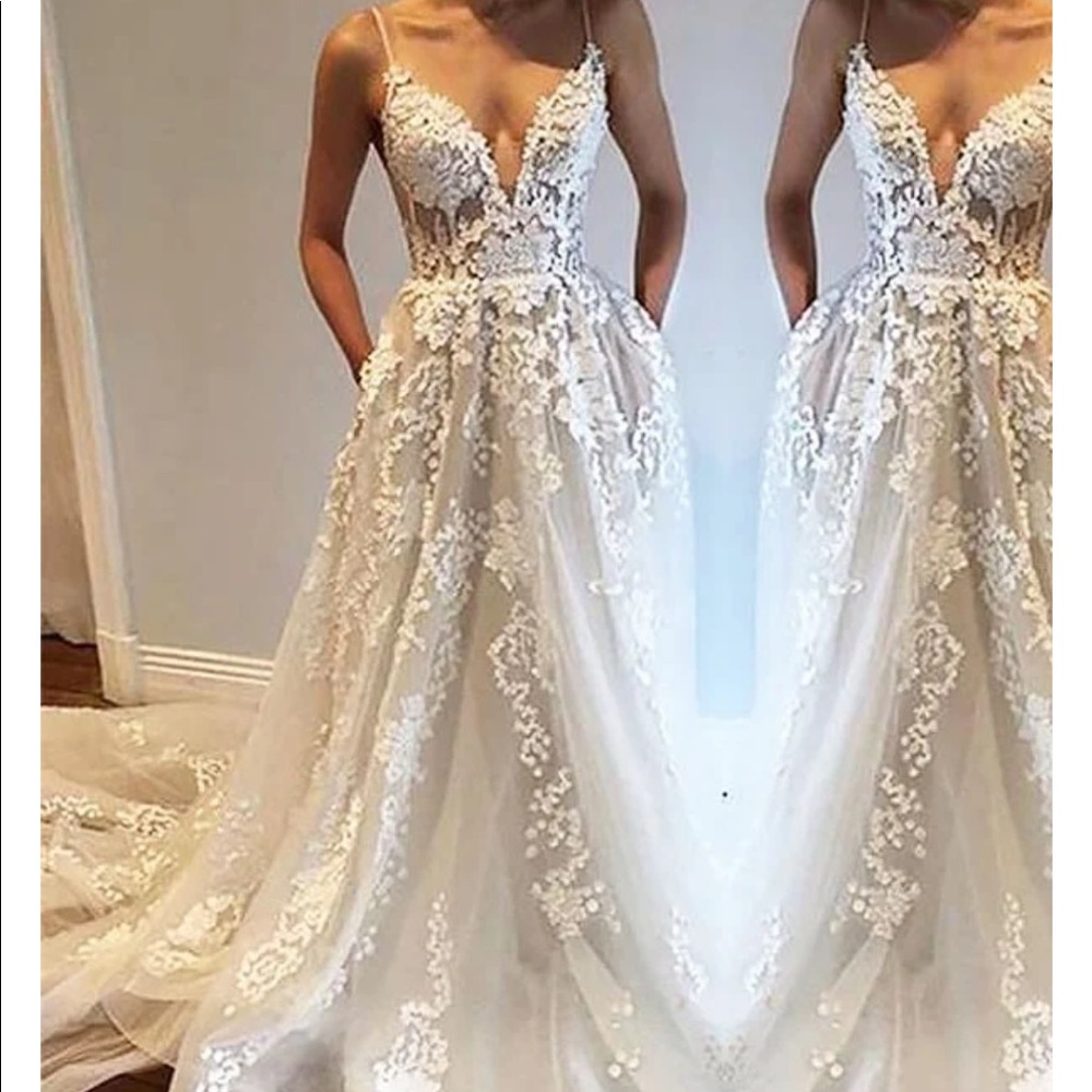 Unworn Wedding Dress.
